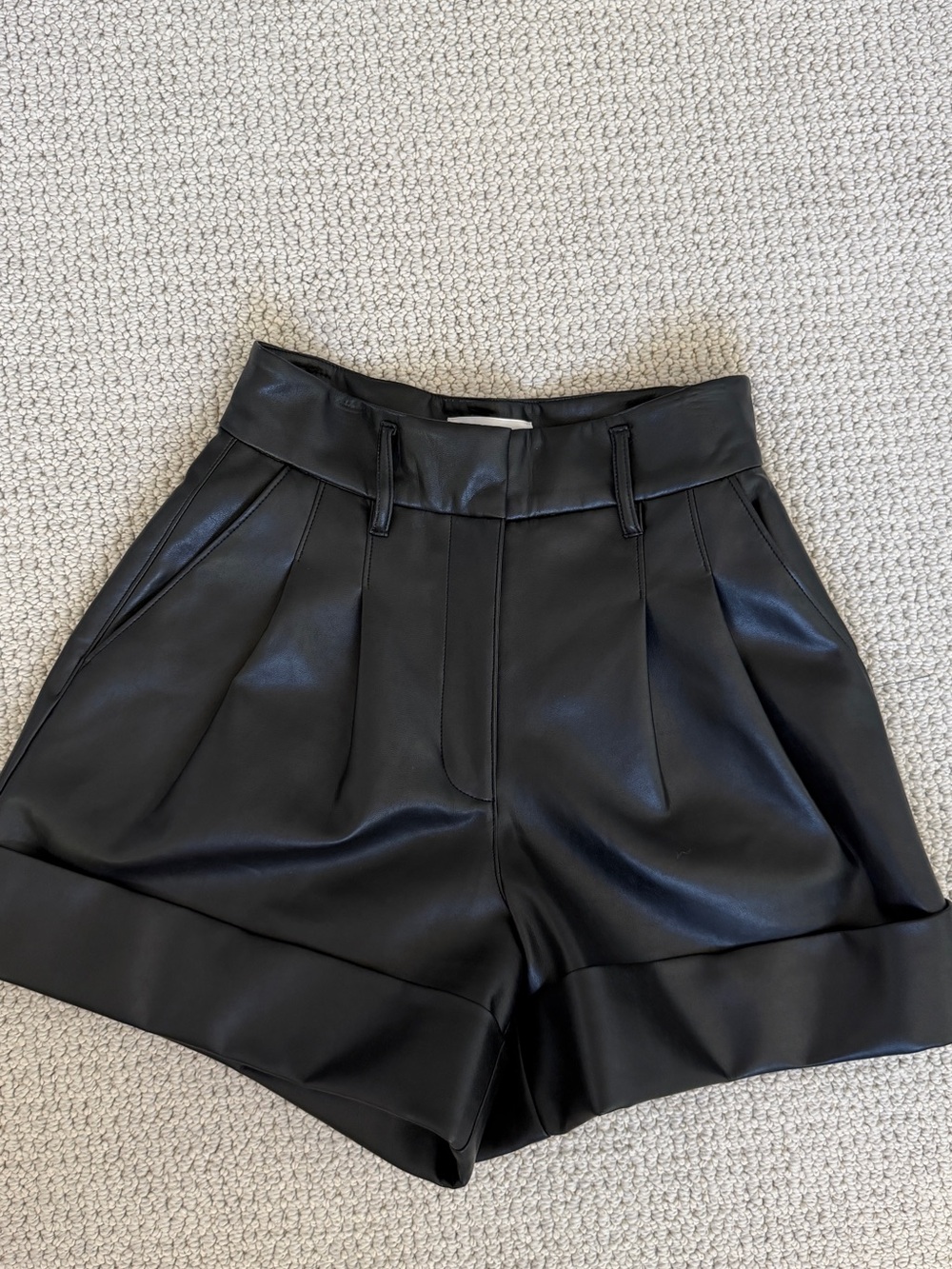 Aritzia Black High-Waist Faux Leather Pleated Shorts
